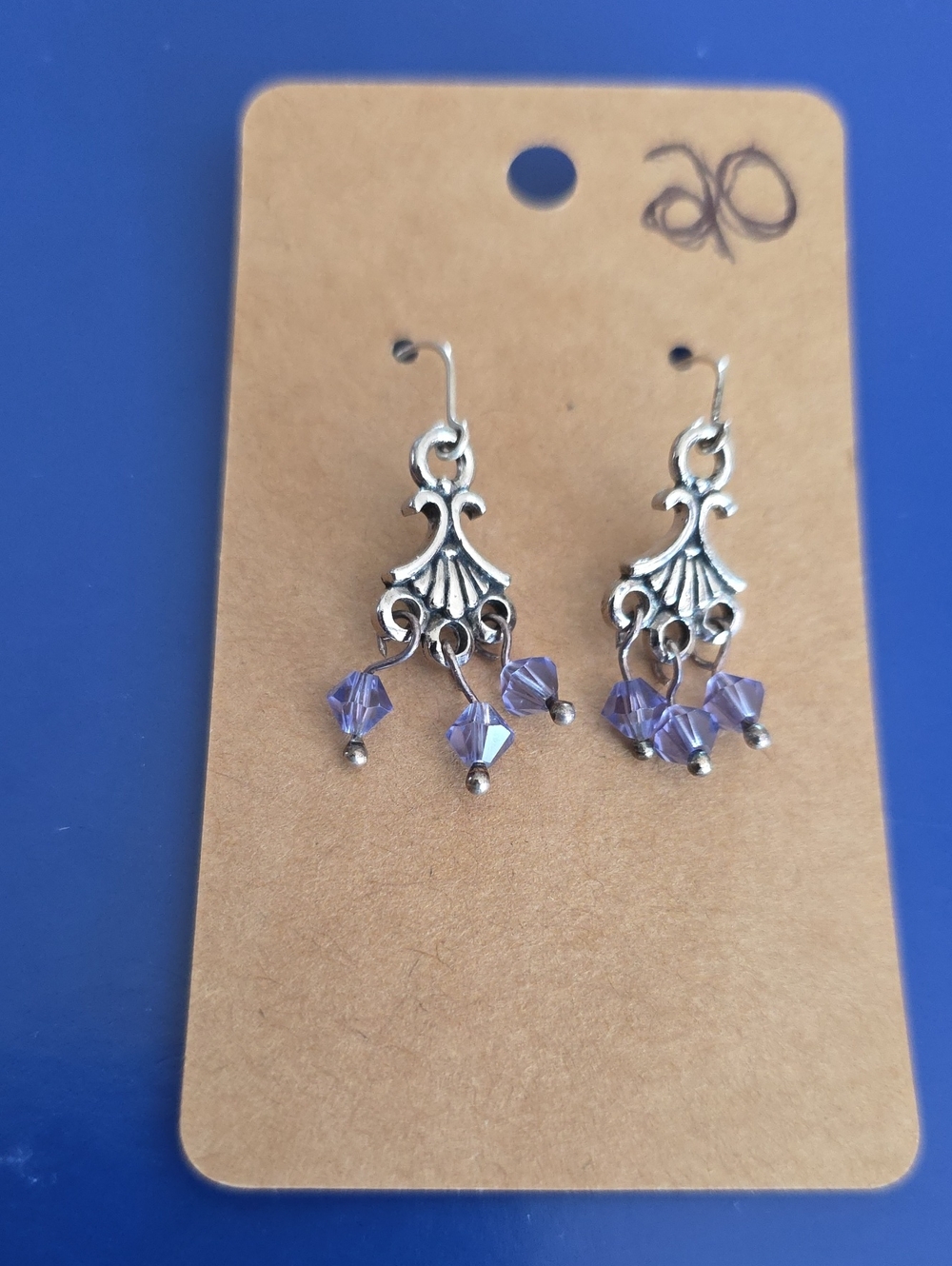 Delicate Silver Filigree Earrings with Light Purple Swarovski Crystal.